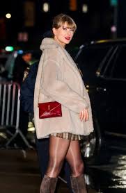 Taylor Swift Performs ‘Aunt Tay’ Duties in a Luxe Winter Coat of Many Fall Colors