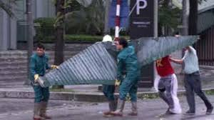 Typhoon Yagi Tears Windows Off Balcony