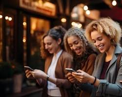 صورة group of people using smartphones