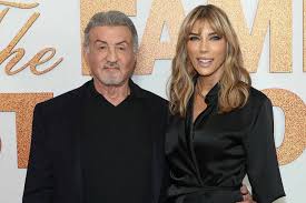 Sylvester Stallone shares a loving moment with Jennifer Flavin