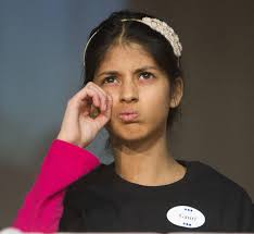 Gauri Garg, of Bear River Charter School, makes a face as she thinks about her answer during the state-level competition of the National Geographic Bee ... - 1328271