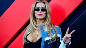 Tom Brady’s SI Swim model ex almost falls out of bra-free dress during wild 007 party