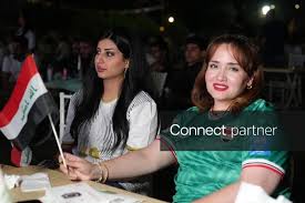 Licensable picture: Football fans in Kirkuk watch Senegal match on giant screens