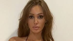 Kanye West's wife Bianca Censori stuns in barely-there sling bikini as she shares VERY daring snap
