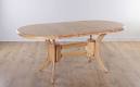 Oval extending dining table