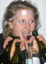 Have a drink on me: Princess Diana&#39;s niece Celia McCorquodale invites a friend to drink out of her bra. Thirsty: Holding four wine bottles at once - article-0-129AF64C000005DC-127_306x423