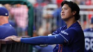 Dodgers' Ohtani says knee improving but biceps still an issue