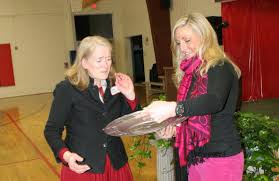 Dr. <b>Sarah Foulger</b>, left, receives the YMCA&#39;s highest award, the Character <b>...</b> - 2014-04-08%252005.19.11%2520-%2520Copy_0