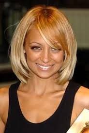 Nicole Ritchie Hairstyle. You&#39;ll want your bangs to be long and blend in with the rest of your hair, which should fall above the shoulders. - nicole-ritchie