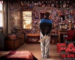 Image of Fan (2016) movie scene of Gaurav Chandna looking at Aryan Khanna's poster