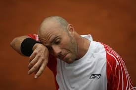 Luis Horna of Peru reacts after losing the game during a double.