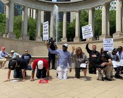 Image of people from different cultures standing together in Chicago