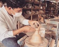 Image of Cambodian ceramic artisans at work