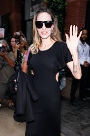 Angelina Jolie's Stylish Cut-Out Maxi Dress: A Must-Have for Effortless Transitional Fashion - 1