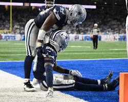 Hình ảnh về CeeDee Lamb concussion injury vs Lions play