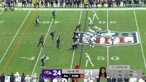 Brevyn Spann-Ford uses a mini hurdle to pick up 19 yards against Ravens