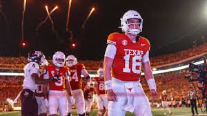 College football players competing during a Week 1 game