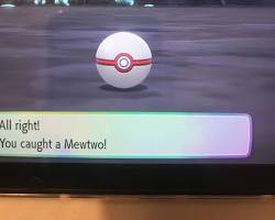 Premier Ball being thrown at Mewtwo in Pokémon GO