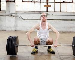 Image of person lifting a heavy weight