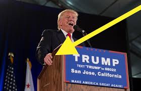 Image result for trump two hands on podium