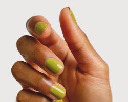 Medium skin with green nail polish