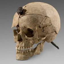 Ancient warrior's iron-nailed skull discovered in archaeological find