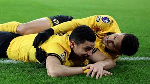 Premier League: Wolves score injury-time winner to beat Liverpool