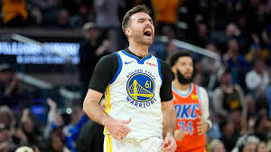 Pat Spencer signing with the Warriors