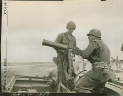Soldiers firing a machine gun at Fort Benning, Georgia on 12 ...