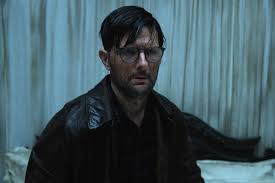 Adam Scott deserves severance for putting up with Hokum’s ho-hum horror