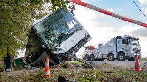 Bus carrying 12 people crashes into a ditch in northern France