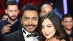 بالفيديو تامر حسني يخفي وجه
