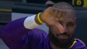 Booker Exits Early as Suns Battle Lakers in LA