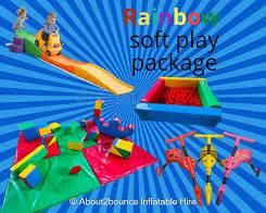 Image of About2Bounce staff delivering a soft play inflatable