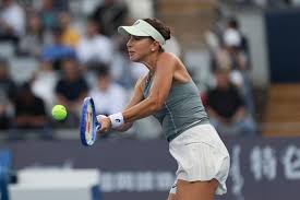 Coco Gauff in action during a WTA match