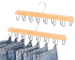 Image of pair of blue jeans on a wooden hanger.