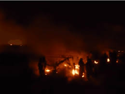 Image result for The Jungle burns in Calais