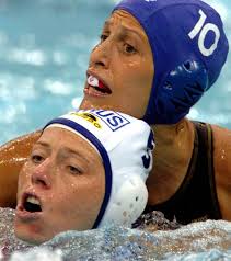 Canadians Jana Salat and Russian Elena Smurova battle for the ball during Waterpolo action during the Athens 2004 Summer Olympic Games August 16, 2004. - Waterpolo-Salat-Smurova-1-v6