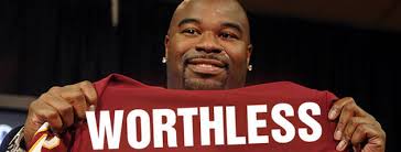 So apparently Albert Haynesworth the infamously overpaid Washington Redskins player swiped his credit card through some waitresses tits. - albert-haynesworth1