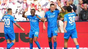 Schick stars as Leverkusen claims key Rhine derby