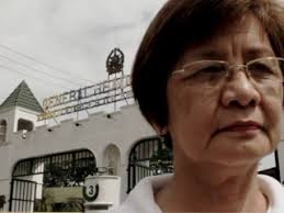 In this file photo, Edith Burgos, mother of abducted activist Jonas Burgos, stands outside the national headquarters of the Armed Forces of the Philippines ... - editho