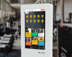 Image of interactive exhibition booth with touchscreens
