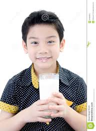 Portrait of Little asian boy drinking a glass of milk; isolated on white background . MR: YES; PR: NO - portrait-little-asian-boy-drinking-glass-milk-isolated-white-background-36056633