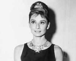 Image of Audrey Hepburn in little black dress at Breakfast at Tiffany's premiere