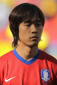 Park Chu-Young of South Korea stands in the line up ahead of the 2010 FIFA World Cup South Africa Group B match between South Korea and Greece at Nelson ... - South%2BKorea%2Bv%2BGreece%2BGroup%2BB%2B2010%2BFIFA%2BWorld%2BZPhyvAfje3Il