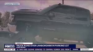 VIDEO: Truck runs over 250K Lamborghini in parking lot