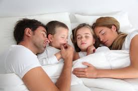 Image result for pictures of men snuggling with wife and kids