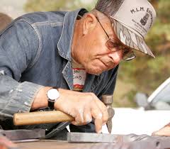 Straightening the twist, using wood blocks, to avoid damaging the ridges of the twist.. Ben Lund preparing to make a precision punchmark. - ben-lund-preparing-to-punch-a-guidemark-hole