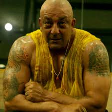 With a shaved head and a beefed up torso to play the notorious Kancha Cheena, Sanju Baba shows it off on Twitter. - sanju-agneepath