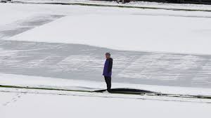 Dodgers-Rockies off to frigid start as snowstorm coats Coors Fields